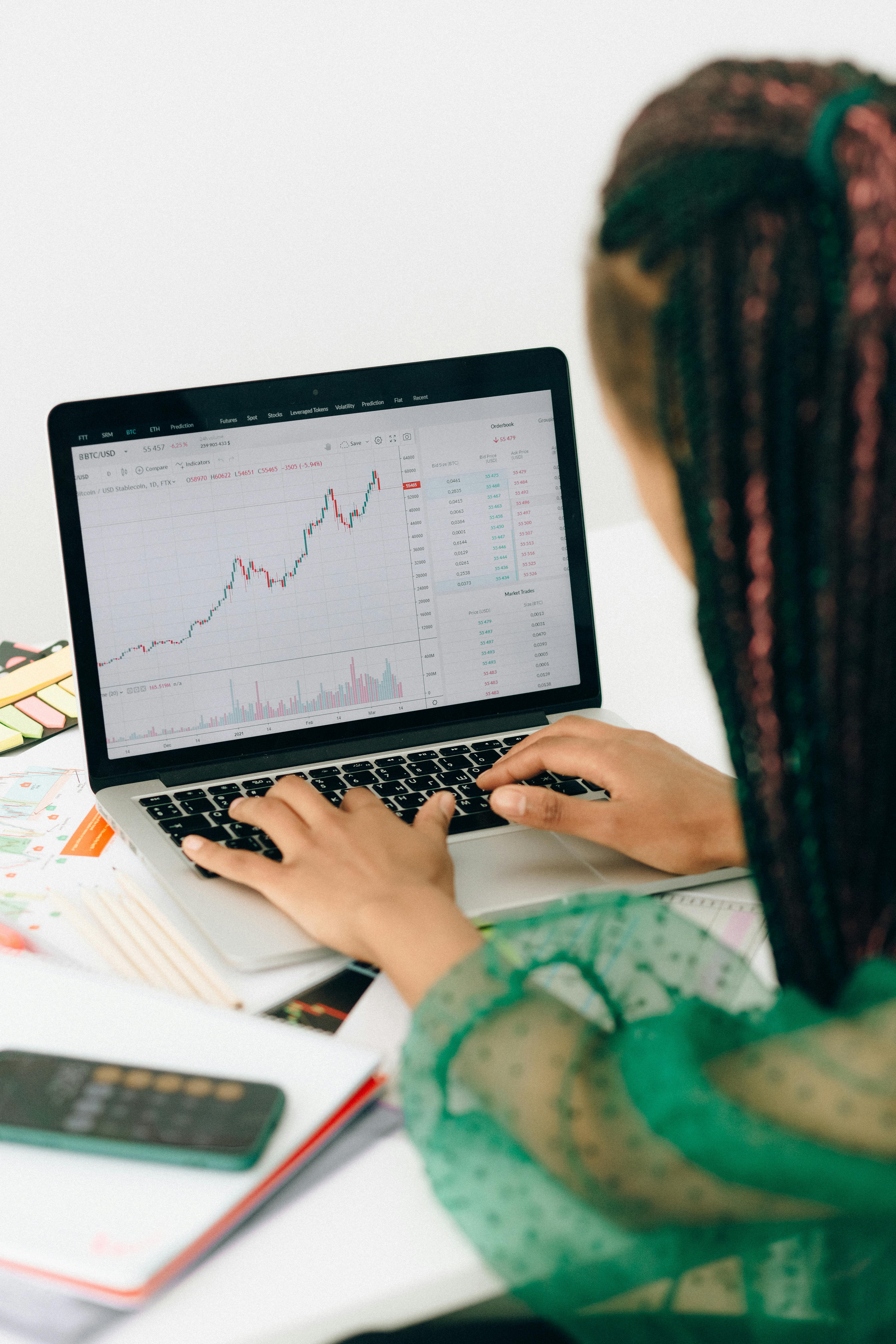 Analyst reviewing risk and portfolio reports